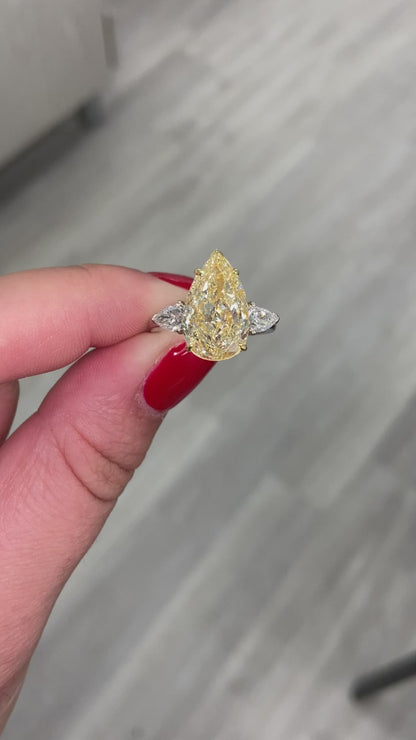 4.10 Fancy Yellow Lab Grown Pear Cut Diamond Three Stone Engagement Ring